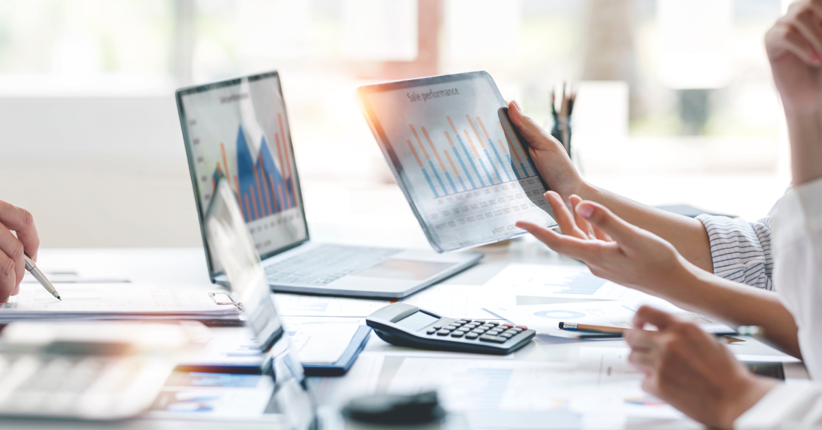 Team analyzing pricing and product strategies to achieve higher margin goals in 2025